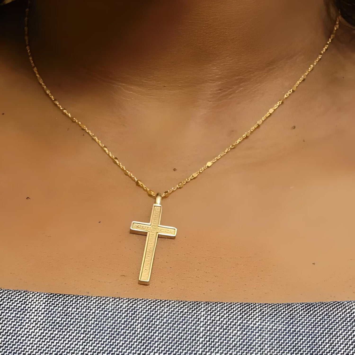 close-up of 18k gold cross pendant - fine faith jewelry design