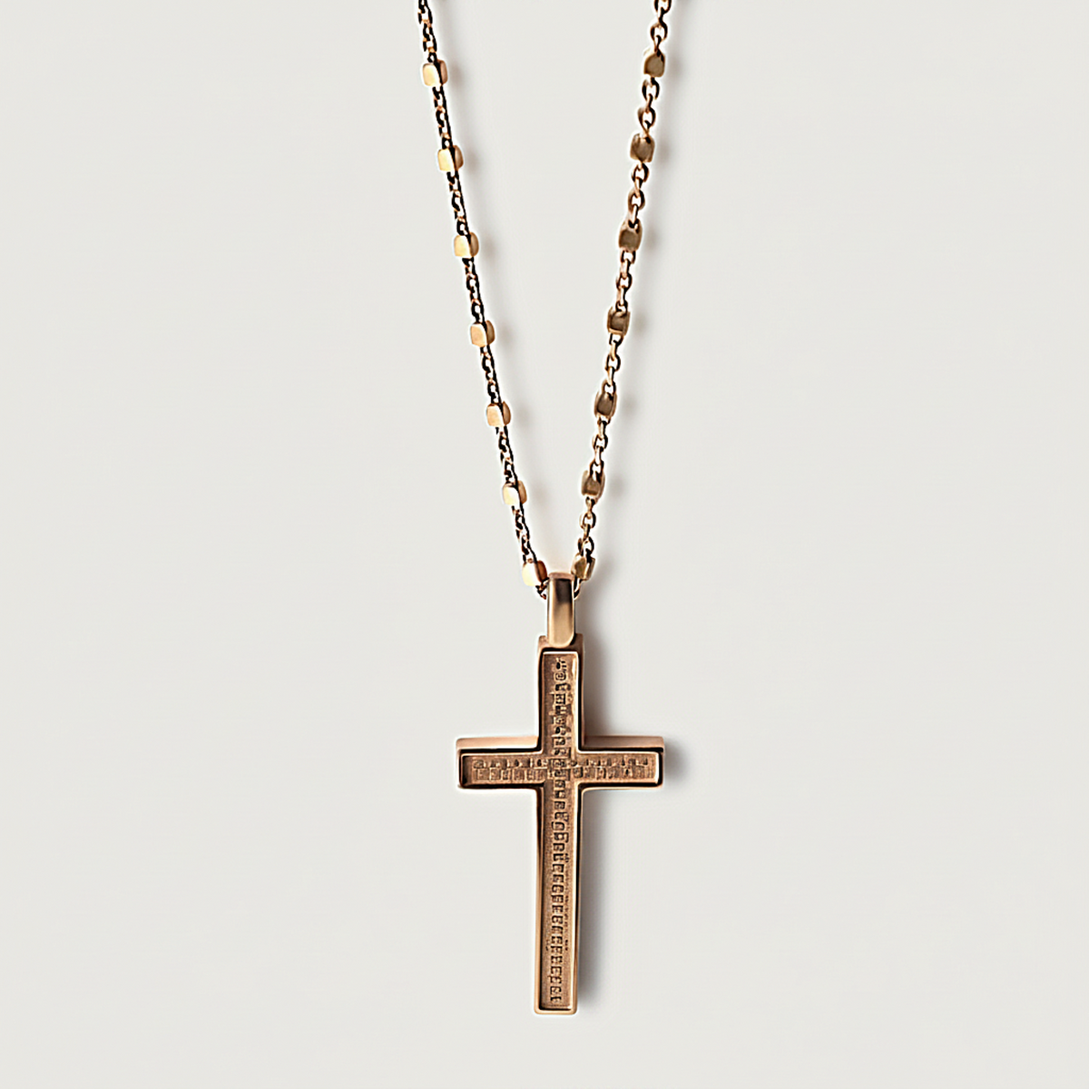 Front view of the Rachel's Worth 18K Rose Gold Vermeil Cross Necklace with a polished cross pendant.