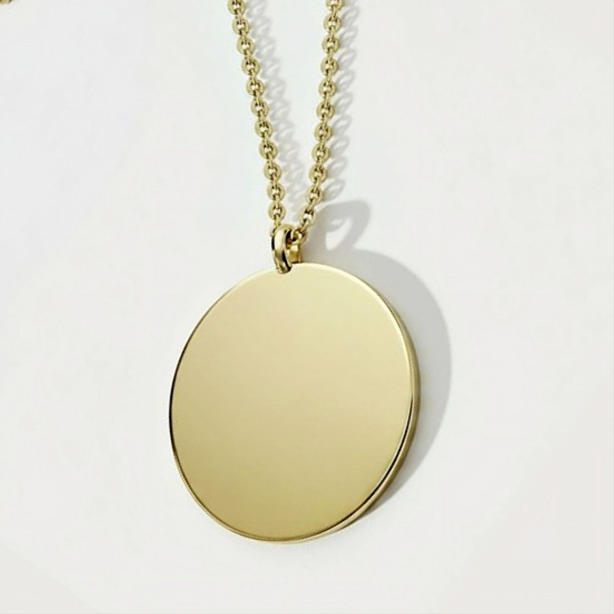 Back view of the Confident Identity Yellow Gold Vermeil Coin Pendant Necklace showing its polished construction.