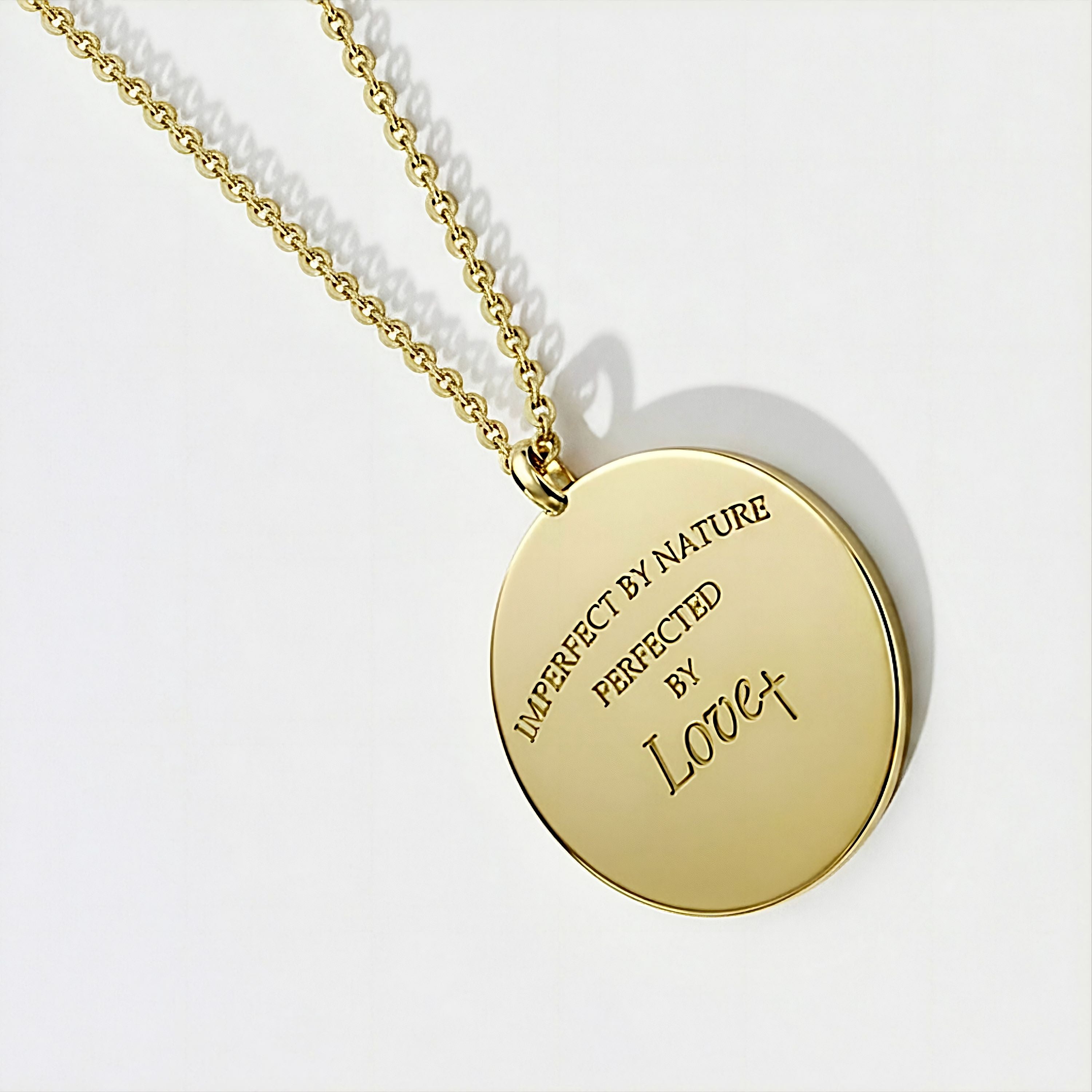 Angled view of the Rachel's Worth Imperfect by Nature, Perfected by Love 14K gold vermeil Christian coin necklace engraved with an inspiring faith-based message.