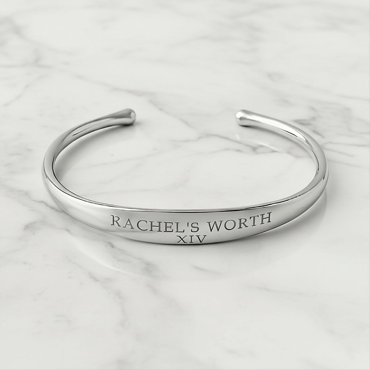 Front view of the XIV Sterling Silver Cuff Bracelet highlighting its polished open-cuff silhouette.