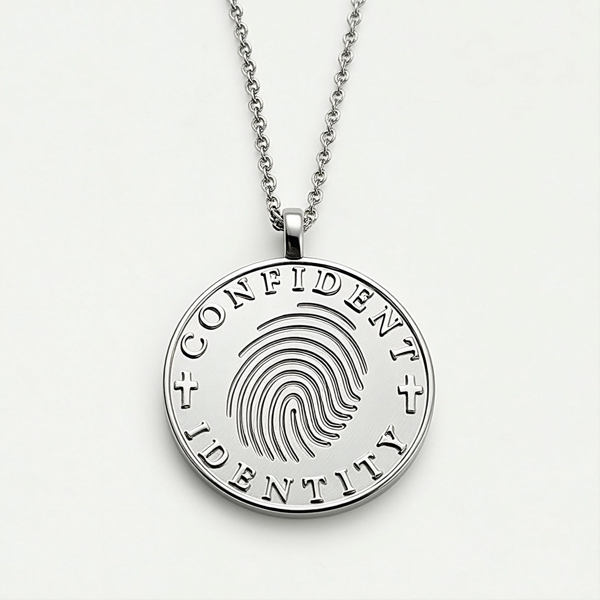 Close-up of the Rachel's Worth Confident Identity sterling silver coin pendant highlighting its meaningful design.