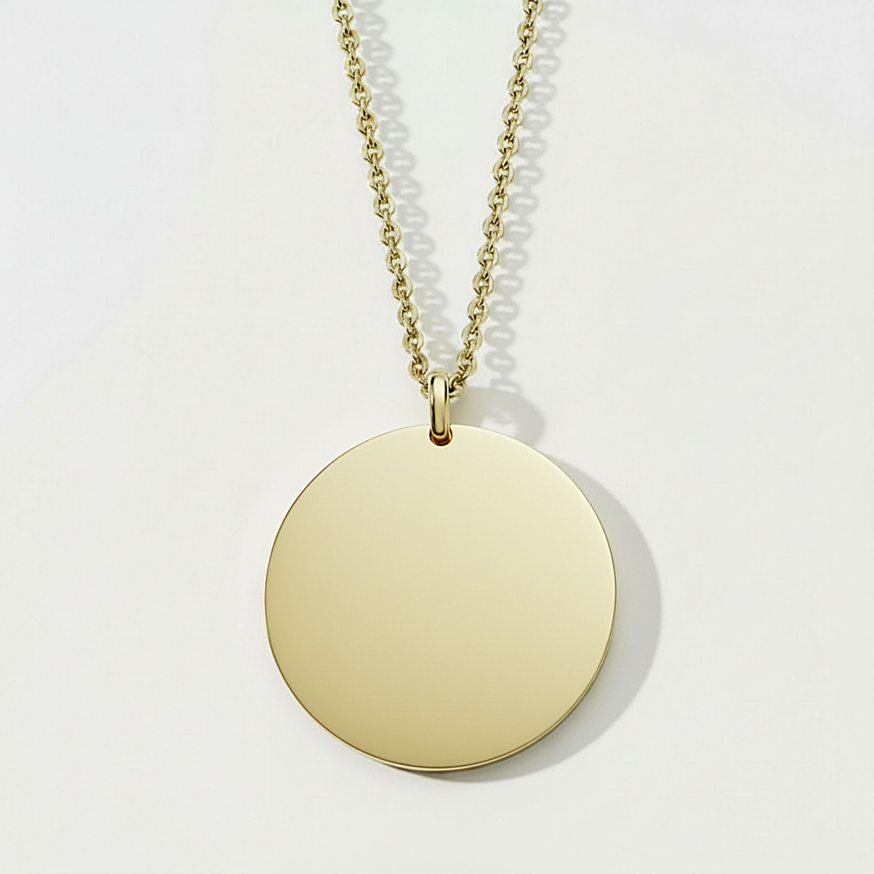 Back of the Rachel's Worth Imperfect by Nature, Perfected by Love 14K gold vermeil coin necklace featuring a smooth, polished surface suitable for personalized engraving.