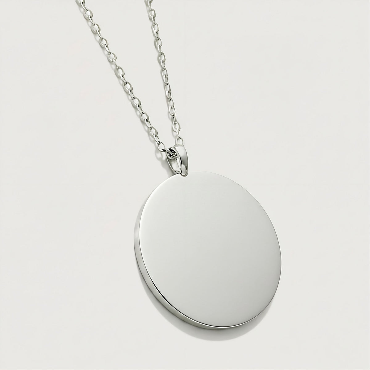 Back view of the Legacy Sterling Silver Coin Pendant Necklace showing its polished construction.
