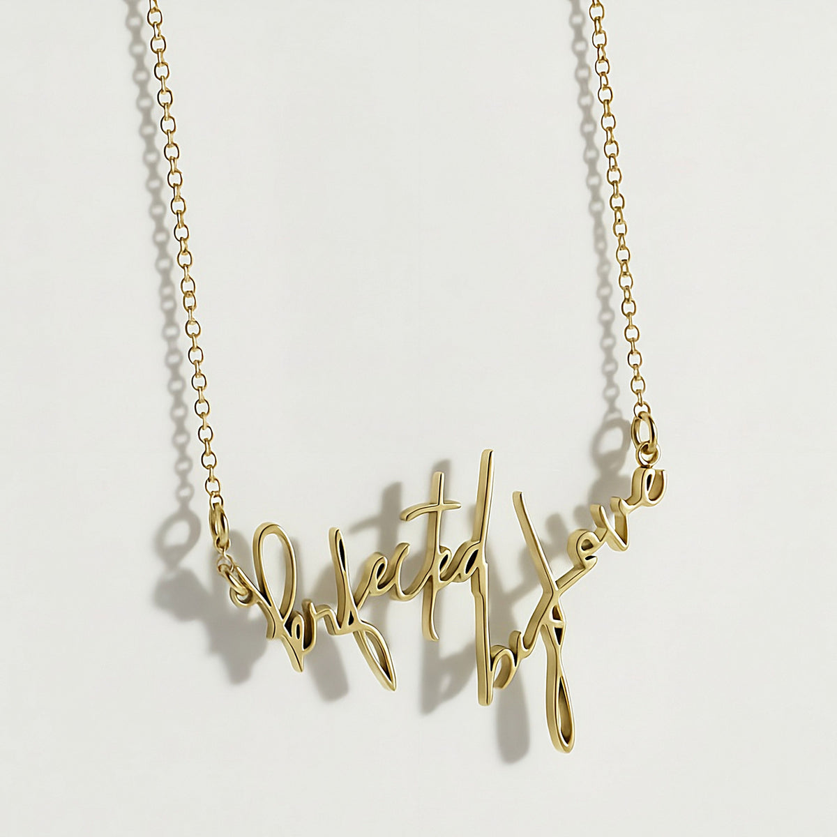 Detailed view of the 18K gold vermeil craftsmanship on the Rachel's Worth Perfected by Love Necklace.