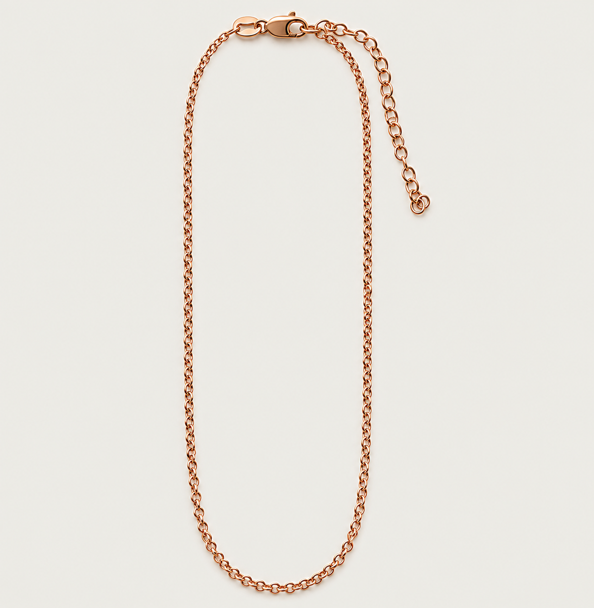 Close-up of the Perfected by Love 18K Rose Gold Vermeil Necklace showing the diamond-cut rolo chain, 2-inch extender, and lobster-claw clasp.