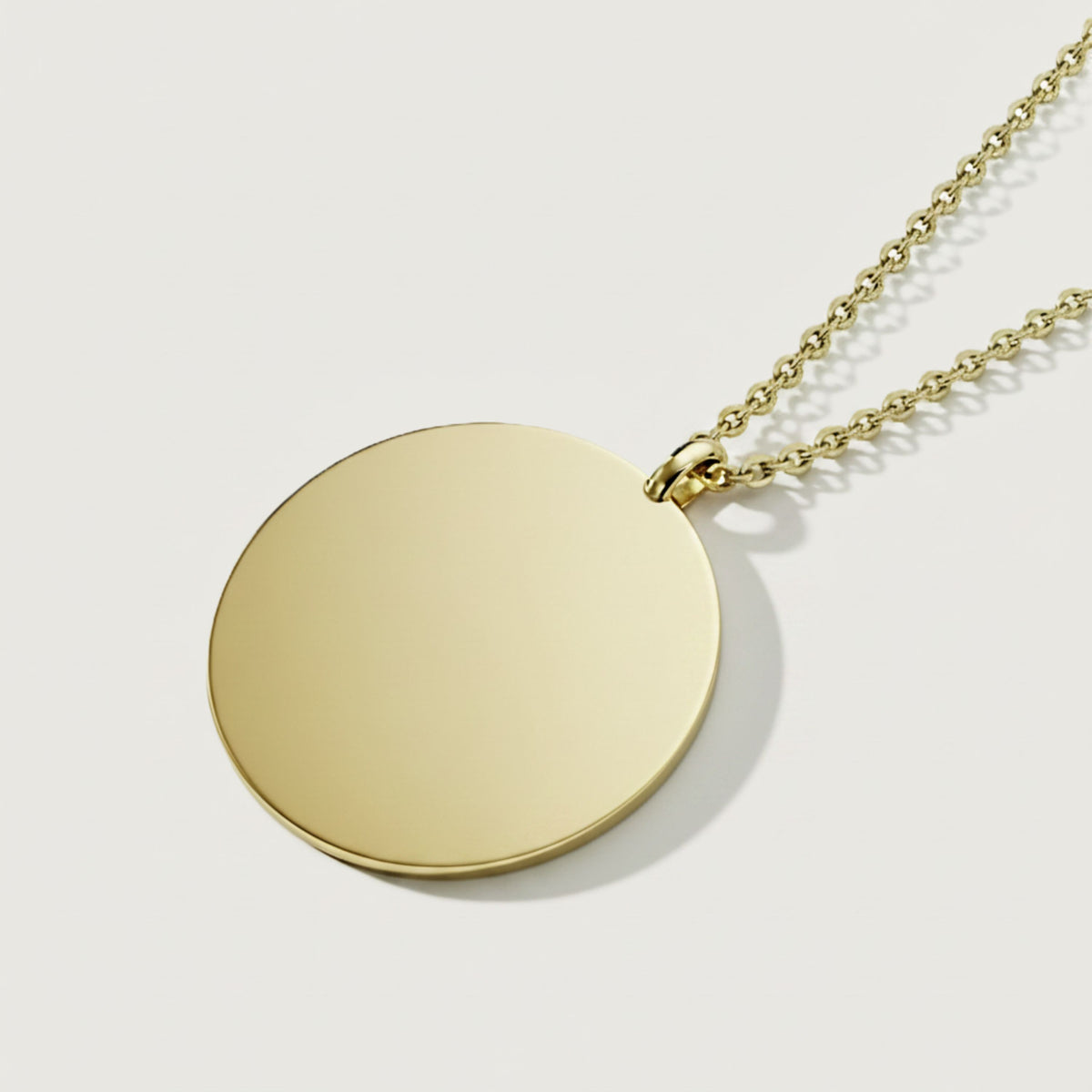 Back view of the Perfected by Love Solid 14K Gold Coin Pendant Necklace showing its polished construction.