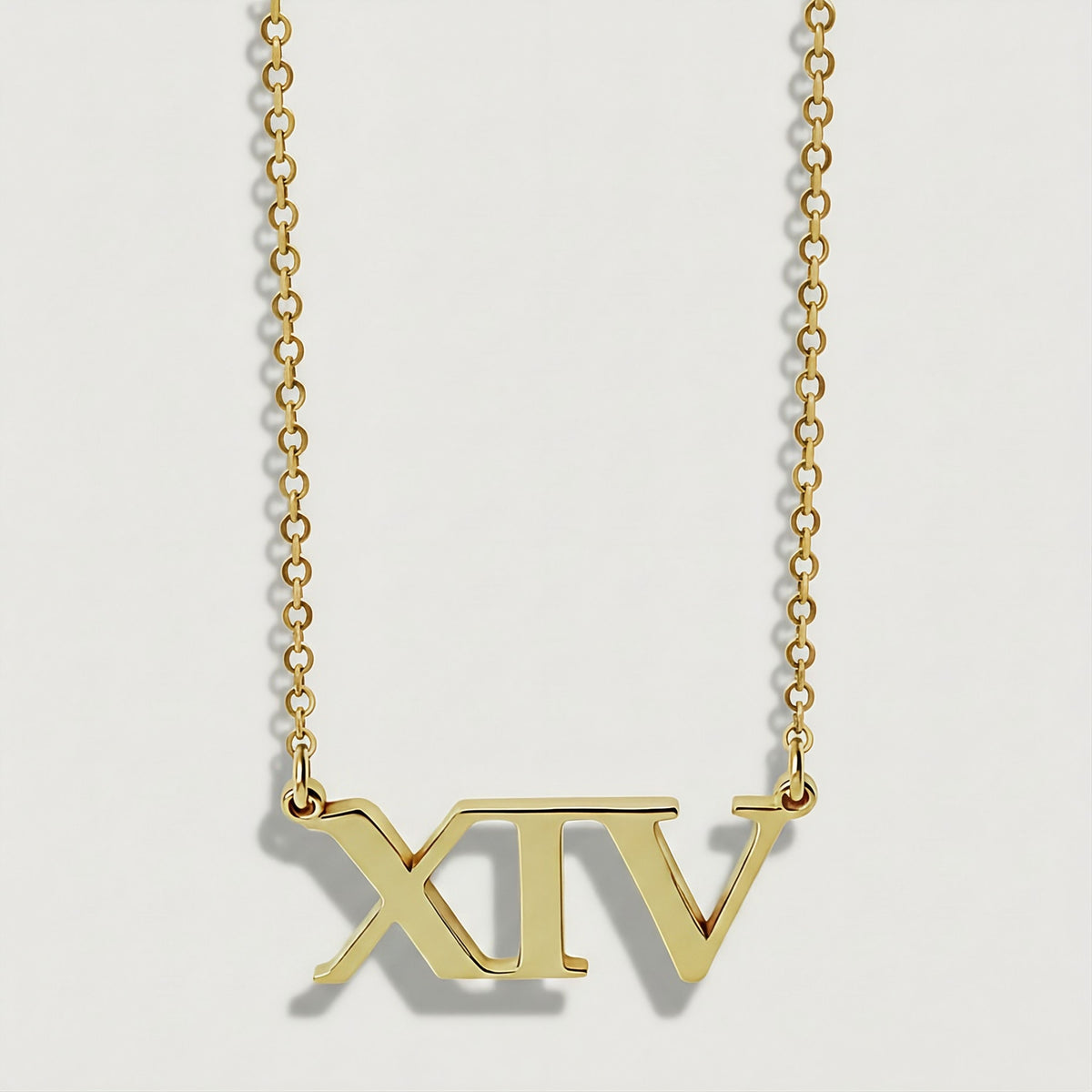 Front view of the XIV 18K Yellow Gold Vermeil Pendant Necklace with its streamlined Roman numeral design.