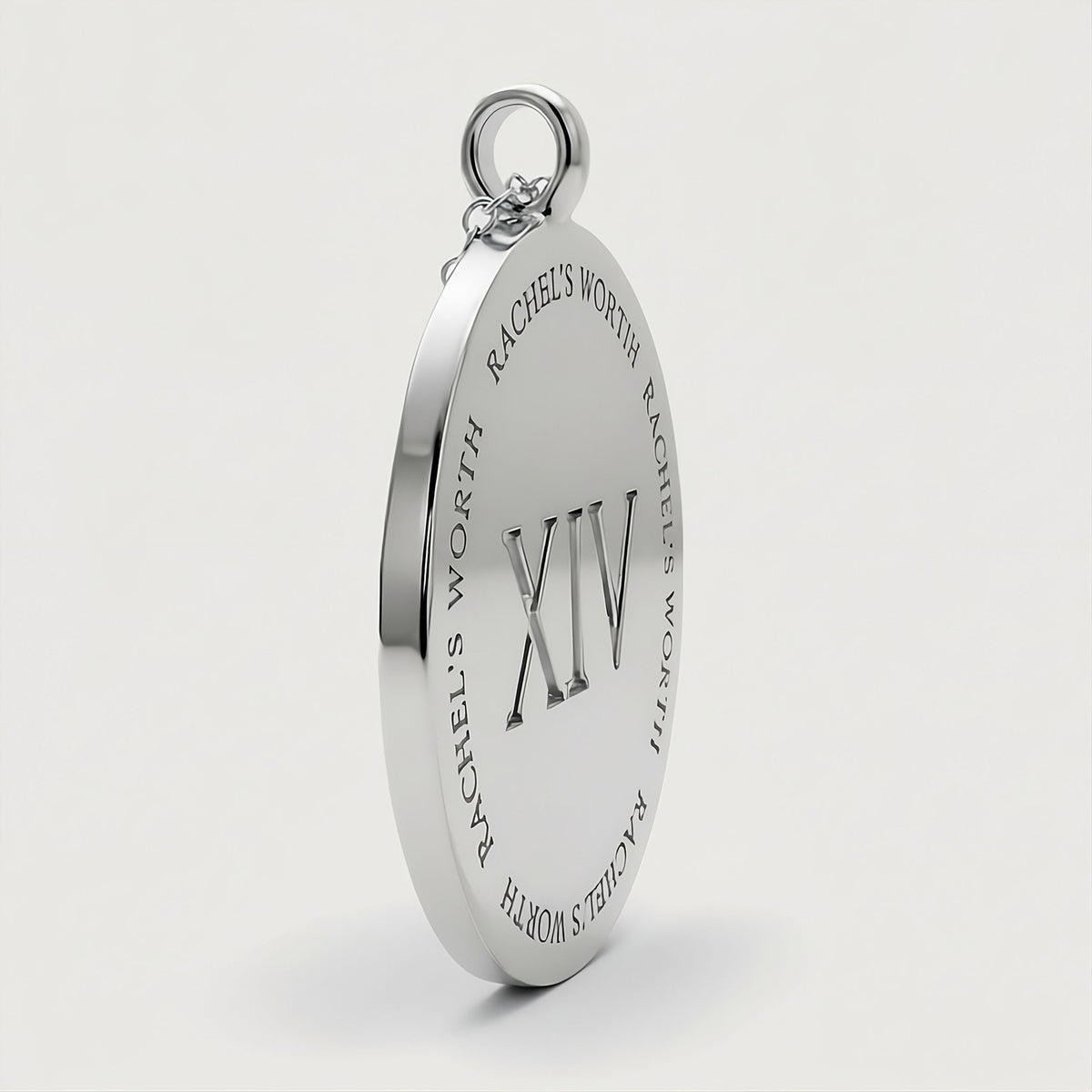 Close-up of the XIV symbol on the Rachel's Worth Sterling Silver Coin Pendant Necklace.